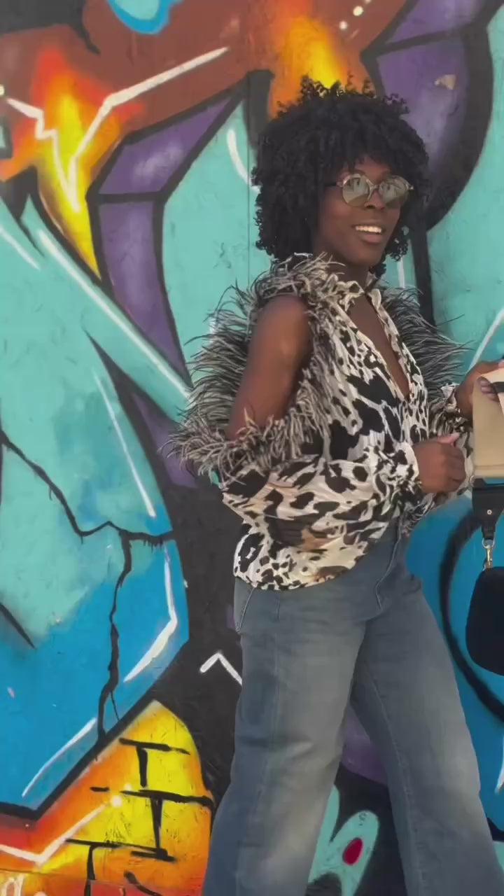Blusa con marabù Dahlo